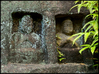 Two buddhas outside cave
