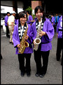 Two girls playing saxophone